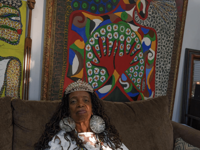 Queen Shamala Bessie Davis Fayemi Smith poses for a portrait in her home in Gardena, California, on November 19, 2022. Smith is a longtime artist and educator who recently released her book, “Breaking the Cycles of Pain: Soul Secrets, A Memoir.” The book is the first in a trilogy detailing her life story and trauma she overcame as a Black woman.