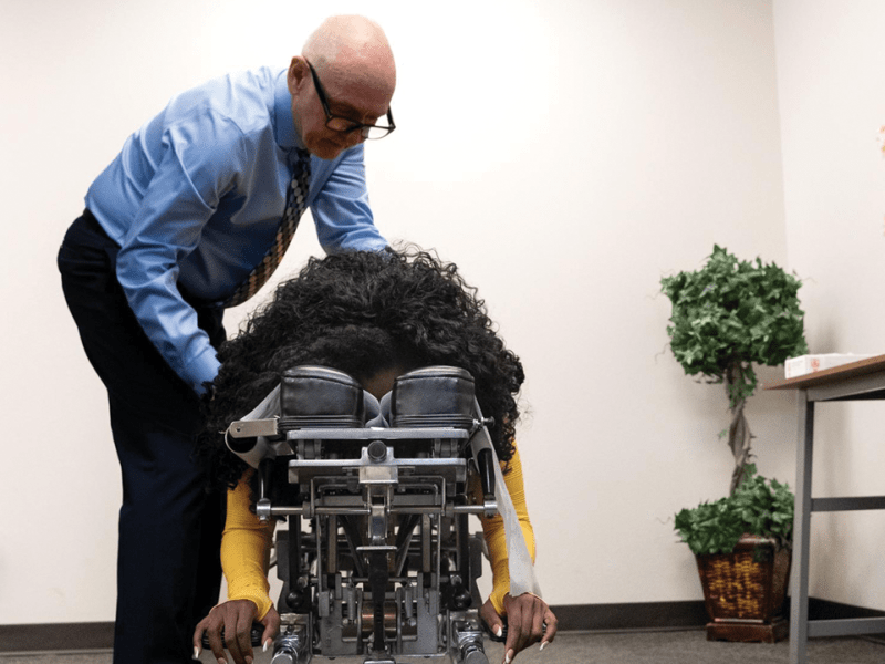 Dr. Shamus Sheridan gives Briana Rice a chiropractic adjustment in his office at Sheridan Chiropractic Inc. in Riverside County on March 22, 2024. In December 2021, Rice, 38, was on her way home from work when she was rear-ended by a semi-truck. She suffered a traumatic brain injury (TBI), a spinal injury and post-traumatic stress disorder (PTSD).