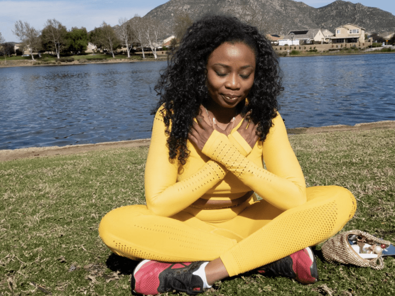 Rice takes a moment of gratitude by the lakeshore on March 22, 2023. Part of her healing process includes walking and practicing meditation outdoors. Rice notices the progress in her physical strength and hopes to soon begin hiking.