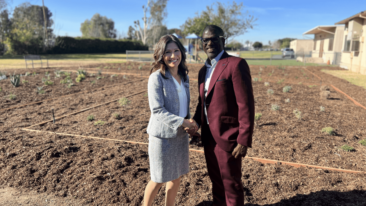 Miki Rene Inbody, Superintendent of Schools Fontana Unified School District (L) and Dr. Daniel Walker (R) stand before the O’Day Short Family Unity Garden at Randall Pepper Elementary School in Fontana, CA, on Friday, December 15, 2023. The Unity Garden was dedicated to commemorate the lives of O’Day, Helen, Barry and Carol Ann Short.