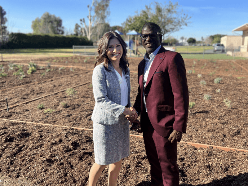 Miki Rene Inbody, Superintendent of Schools Fontana Unified School District (L) and Dr. Daniel Walker (R) stand before the O’Day Short Family Unity Garden at Randall Pepper Elementary School in Fontana, CA, on Friday, December 15, 2023. The Unity Garden was dedicated to commemorate the lives of O’Day, Helen, Barry and Carol Ann Short.