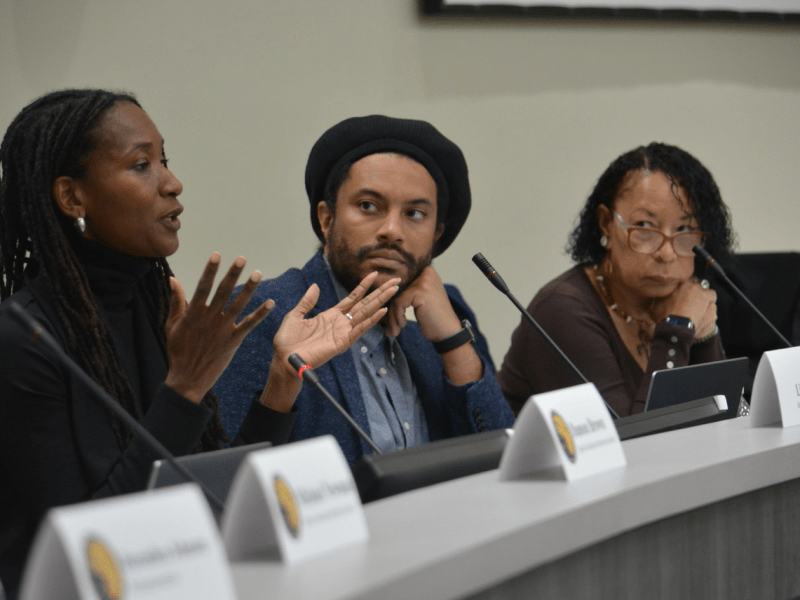 California Reparations Task Force members Civil Rights Attorney Lisa Holder, Dr. Jovan Scott Lewis, and Dr. Cheryl Grills at the 14th meeting in Sacramento, California, on March 29, 2023. The members of the task force were presented with an $800 billion amount from economic experts to cover harms in three categories.